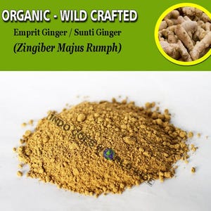 May include: A close-up of a pile of light brown organic wild crafted Emprit Ginger/Sunti Ginger (Zingiber Majus Rumph) powder. The text "ORGANIC - WILD CRAFTED" is at the top of the image. The text "Emprit Ginger/Sunti Ginger (Zingiber Majus Rumph)" is below the first line of text. The text "INDO GOES" is in the lower left corner of the image.