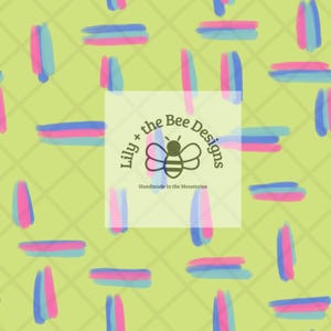 May include: A repeating pattern of colorful brushstrokes in pink, blue, and purple on a light green background with a diamond grid. The design includes the text "Lily + the Bee Designs" and "Handmade in the Mountains".