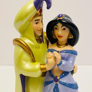 Vintage Disney Porcelain Princess Jasmine and Aladdin 5.5” Tall Figurine.