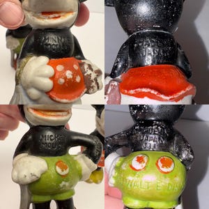 May include: Vintage Mickey Mouse figurines. The black and white figures have green, red, and white accents. The text "MICKEY MOUSE" is visible on one figure. The figures are marked "MADE IN JAPAN" and "WALT E. DISN".