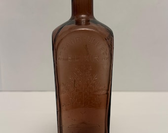 Vintage Embossed Straubhullers Elixir -Tree Of Life Purple Bottle Taiwan A-4.