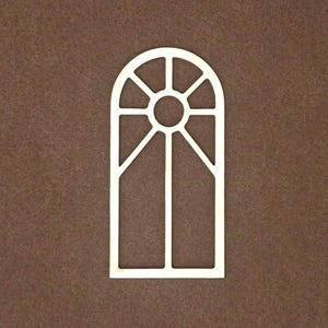 May include: A light-colored wooden cutout in the shape of an arched window frame. The design features a central vertical mullion, a circular top pane, and four radiating spokes that divide the upper arched section into distinct segments.
