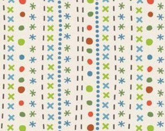 May include: A white fabric with a repeating pattern of blue, green, red, and brown dots and dashes. The pattern is arranged in vertical stripes.
