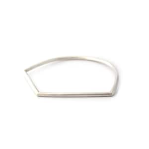 May include: A silver geometric ring with a flat, straight bar across the bottom.
