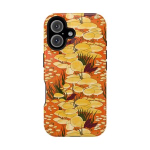 May include: A phone case with a pattern of yellow mushrooms on an orange background. The case has a black camera cutout.