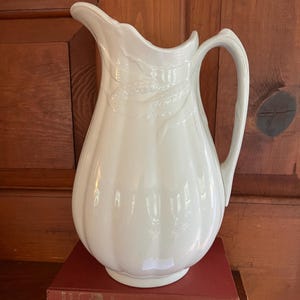 Antique Baker & Co Tall Ironstone Pitcher adorned with Wheat and Grass Detail