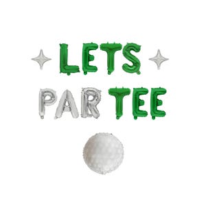May include: Green and silver foil letter balloons spelling out LETS PAR TEE, accompanied by two silver star-shaped balloons and one round white golf ball balloon. The letters are arranged in two rows with the golf ball centered below.