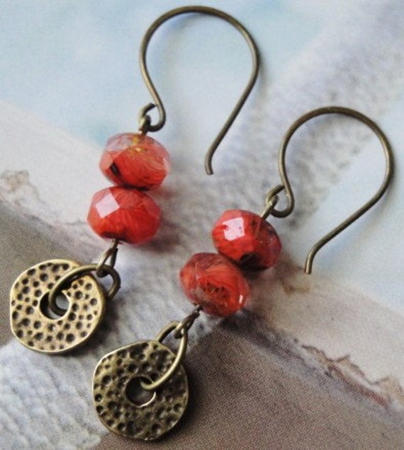 Items similar to Organic Metal Discs And Coral Colored Glass Earrings ...