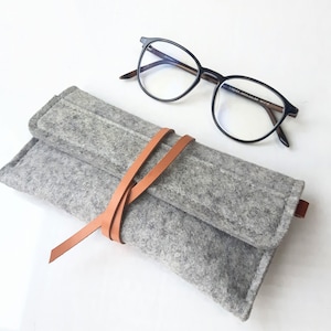 Stylish silver gray wool felt glasses case with  sophisticated wrap around leather closure