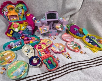 Polly Pocket Ultimate Bundle Rare 91’ Pullout Playhouse and 19 total figures and 9 total play sets
