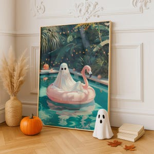 Summerween ghost pool float poster print, tropical Halloween wall art with ghost on pink flamingo float and pumpkins.