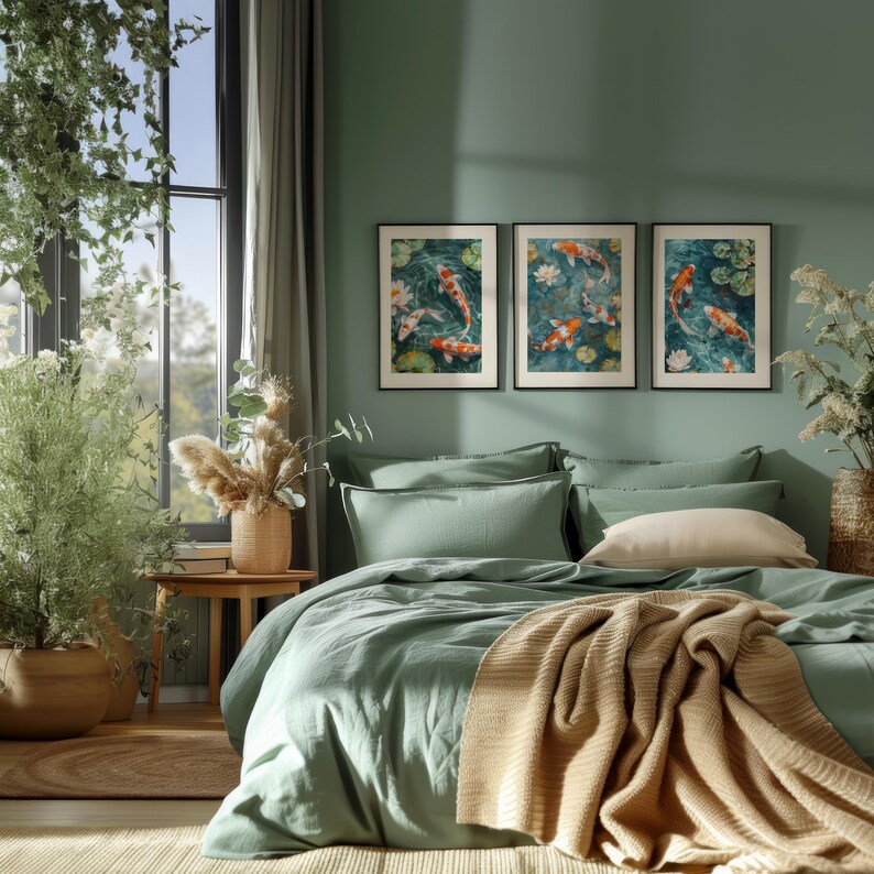 A koi pond painting displayed as a triptych wall art set above a white sofa. This elegant koi fish print adds a peaceful and sophisticated touch to a modern living room.
