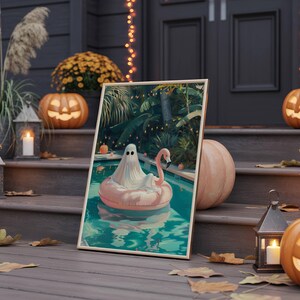 Spooky cute Summerween poster print, ghost Halloween wall art with tropical pool party flamingo float and pumpkins.