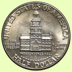 May include: A silver half dollar coin featuring Independence Hall. The coin is inscribed with "UNITED STATES OF AMERICA", "200 YEARS OF FREEDOM", and "INDEPENDENCE HALL". The coin also has the words "HALF DOLLAR" and "E PLURIBUS UNUM".