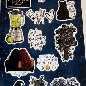 May include: A sticker sheet featuring various designs including a Practical Magic 2 movie poster, a margarita in a blender, a red book, a black cat, a wooden sign reading A LITTLE MAGIC GOES A LONG WAY, and a house with the text THERE'S STILL MAGIC HERE.