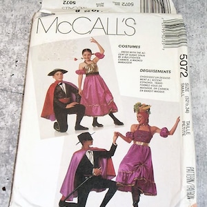 May include: McCall's costume pattern packet featuring illustrations of Spanish-themed outfits. The costumes include a bullfighter, Carmen, and a masked marauder. The packet is labeled "5072" and "SMALL" with measurements of 32 1/2 and 34 inches.