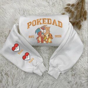 Pokedad Embroidered Sweatshirt – Custom Dad charizard Hoodie, Father's Day Gift from Kids, Personalized Names on Sleeves ESN1988.H.C