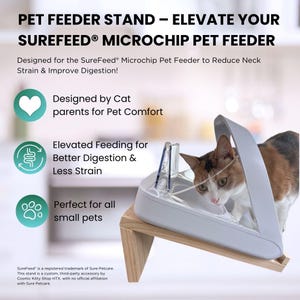 May include: A white pet feeder stand with a wooden base, designed to elevate a SureFeed Microchip Pet Feeder. The stand is shown with a cat eating from the feeder. The stand is designed to reduce neck strain and improve digestion for pets. The image includes the text "Designed by Cat parents for Pet Comfort", "Elevated Feeding for Better Digestion & Less Strain", and "Perfect for all small pets".