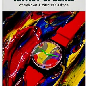 Puede incluir: Reloj Swatch Temps Zero Artist Special con correa roja. La esfera del reloj presenta un diseño abstracto colorido con manecillas verdes. El fondo es una vibrante mezcla de trazos de pintura roja, amarilla y azul. El texto "Wearable Art. Limited 1995 Edition" es visible.