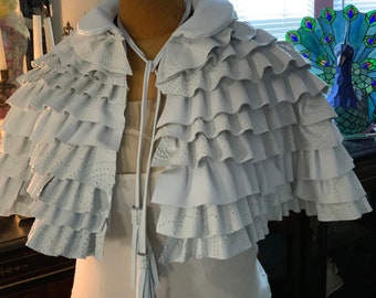 showdiva designs White Lambskin Cape with Layers of Asymmetrical Ruffles