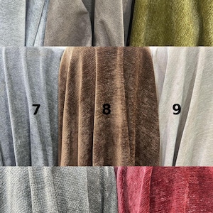 May include: A collection of fabric swatches in various colors and textures. The swatches include shades of gray, green, brown, and red. The fabrics appear to be velvet or a similar plush material, suitable for upholstery or drapery.