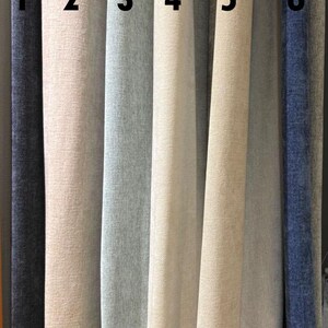 May include: Close-up of six vertical fabric samples in various colors, including navy, beige, light blue, and cream. The text "Linen Thick (Heavyweight fabric)" is at the top. The samples are numbered 1 through 6.