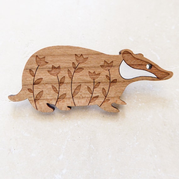 Badger brooch deals