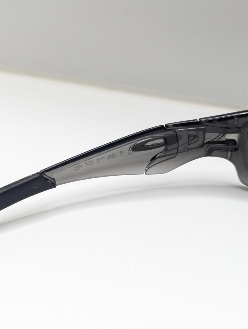 Gafas de sol Oakley Straight Jacket 04-327 para hombre, color gris humo y negro iridio. imagen 11
