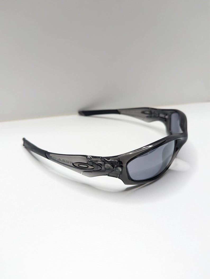 Gafas de sol Oakley Straight Jacket 04-327 para hombre, color gris humo y negro iridio. imagen 5