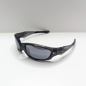 Gafas de sol Oakley Straight Jacket 04-327 para hombre, color gris humo y negro iridio. imagen 7