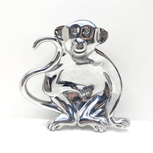 May include: A rustic wooden sign with the text "Welcome to our home" in white lettering. The sign features a distressed finish and a simple, inviting design, perfect for front door decor.