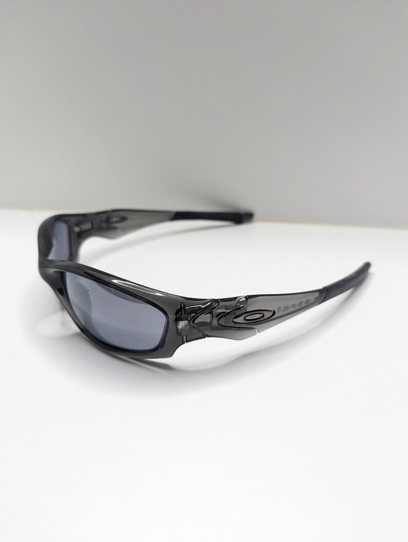 Gafas de sol Oakley Straight Jacket 04-327 para hombre, color gris humo y negro iridio. imagen 8