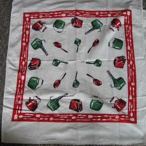 May include: White kitchen towel with a red border featuring utensil silhouettes. The towel is patterned with red and green kitchen tools, including teapots, measuring cups, and ladles. A charming and practical addition to any kitchen.