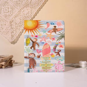 May include: A colorful tablet case featuring a beach theme with cartoon monkeys, a surfboard, and a sun. The design includes starfish, a shrimp, and the words "Paradise Island", "Sunrise", "Surf Spot", "Beach", and "Bar".