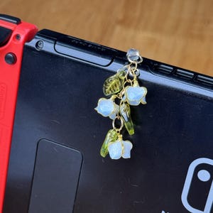 Ciondolo per interruttore a forma di mughetto fatto a mano, ciondolo personalizzato per tappo antipolvere, accessori per interruttori, regali immagine 6