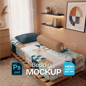 May include: Bedding mockup featuring a bed with a patterned quilt in shades of blue, green, and beige. Includes a blue square pillow and a tan bolster pillow. The image also shows the text "Bedding MOCKUP" and "HIGH QUALITY 150 DPI".