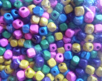 Bead mix, wood, mixed colors, 5x5mm cube. Sold per 90-gram pkg, approximately 1,200 beads.