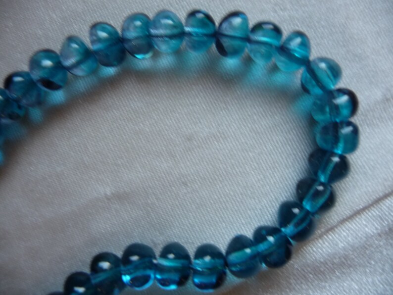 6x8mm Two-Tone AquaCapri Potato Shaped Sold per pack of 25 beads. Czech Glass Beads