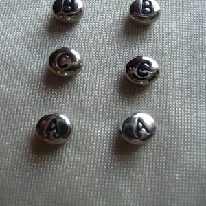 Beads, Tierra Cast, Antique White Bronze Oval, 6.8x6mm, Letter Beads, Pack of 8 beads. You pick the letters you want.