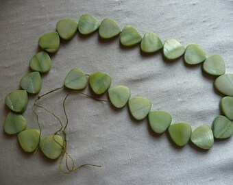 Beads, Mother of Pearl, 16mm Flat Teardrop, Shades of Green. Sold per 16-inch strand. There are 25 beads on the strand.