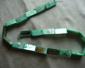 Beads, Mother of Pearl, Shades of Green, 20x10mm Flat Rectangle. Sold per 15-inch strand. There are 20 beads on the strand.