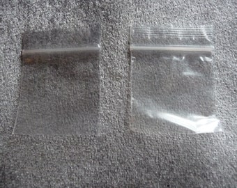 Bag, Tite-Lip, plastic, clear, 1-1/2 x 1-1/2-inch top zip. Sold per pack of 100.