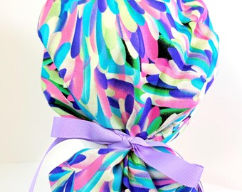 Watercolor PonyTail Surgical Scrub Cap: pink, green, purple