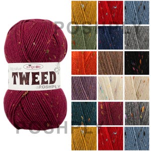 May include: A ball of King Cole Tweed yarn in a deep burgundy shade, speckled with other colours. The label reads "TWEED". A colour chart of various yarn shades is displayed in the background.