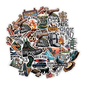 May include: A white ceramic mug with a black handle and the text "But First, Coffee" in a black, bold font. The mug is on a white surface.