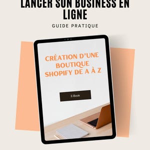 May include: A tablet screen displaying a guide on how to create an online store using Shopify. The guide is titled "Creation of an online store Shopify from A to Z". The screen also shows a laptop computer and a notebook on a wooden desk. The text "E-Book" is displayed on a button.