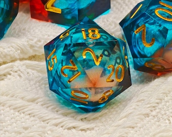 Molten Tide Liquid Core Dice Set – Handmade Resin DnD Dice with Blue & Red Swirl, Golden Numbers, Polyhedral Set for TTRPG