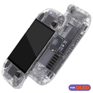 May include: A transparent case for a Nintendo Switch OLED console. The case is clear and shows the internal components of the console. The text "FOR OLED" is printed on the case.