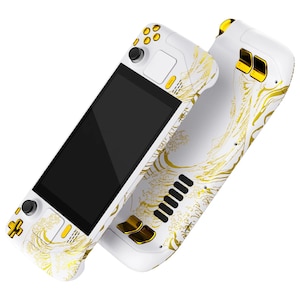 May include: A white handheld gaming console with gold accents and a wave design. The console has a black screen and a gold joystick.