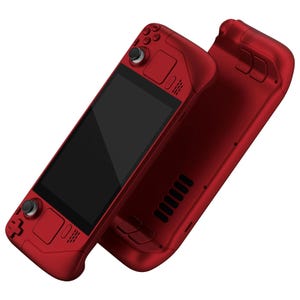 May include: A red handheld gaming console with a black screen and multiple buttons. The console has a textured surface and a sleek design.